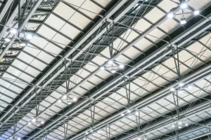 Industrial warehouse with LED high bay lighting fixtures installed